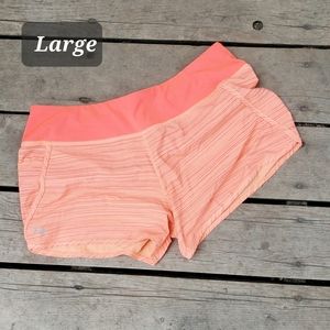 Coral Under Armour shorts